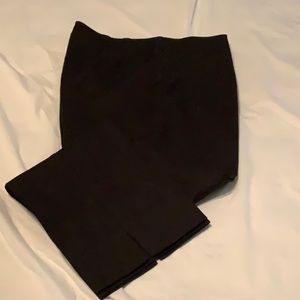 Black flat front trousers.